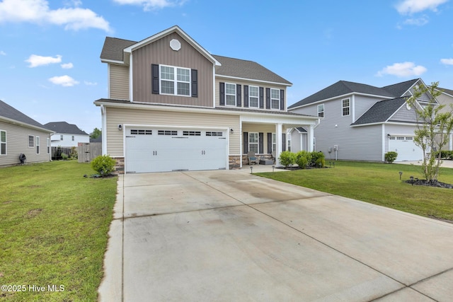 324 Windmill Light Way, Sneads Ferry, NC 28460 - view of front facade featuring a porch, board and batten siding, stone siding, a front yard, and driveway