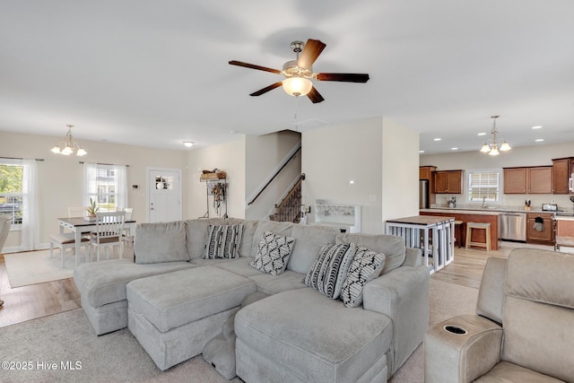 324 Windmill Light Way, Sneads Ferry, NC 28460 - living area featuring a chandelier, light wood-style floors, a ceiling fan, and recessed lighting
