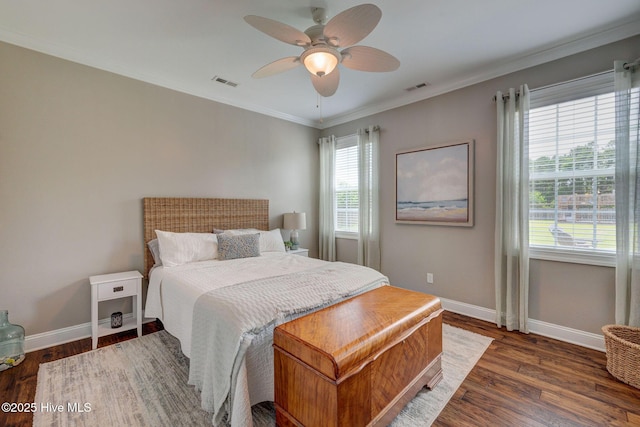 110 E Conolly Ct, Hampstead, NC 28443 - bedroom featuring wood finished floors, crown molding, and ceiling fan