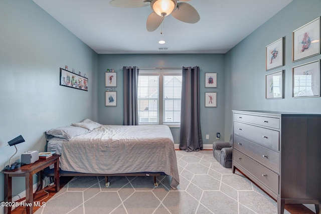 110 E Conolly Ct, Hampstead, NC 28443 - bedroom with ceiling fan and baseboards