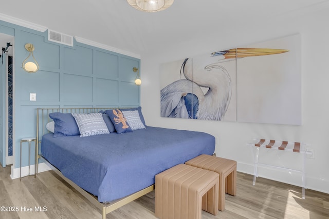 8801 Reed Dr Unit 116West, Emerald Isle, NC 28594 - bedroom with wood finished floors