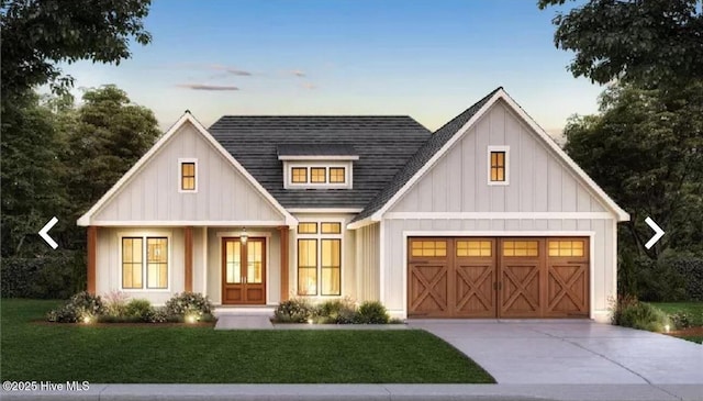 209 Planters Ridge Dr, Sunset Beach, NC 28468 - modern farmhouse style home featuring a front lawn, french doors, a garage, driveway, and board and batten siding