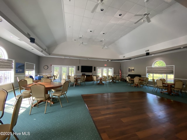 209 Planters Ridge Dr, Sunset Beach, NC 28468 - carpeted dining space featuring a ceiling fan, lofted ceiling, and french doors
