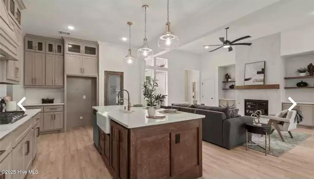 209 Planters Ridge Dr, Sunset Beach, NC 28468 - kitchen with light wood-style floors, ceiling fan, light countertops, and recessed lighting