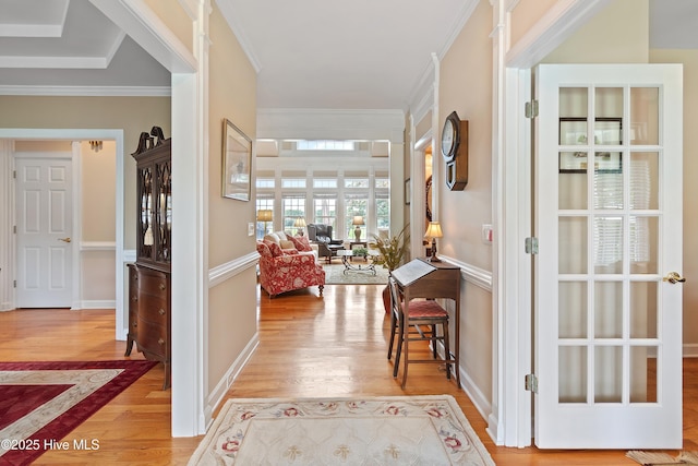 2710 Scarborough Way, Southport, NC 28461 - corridor with light wood-style floors and ornamental molding