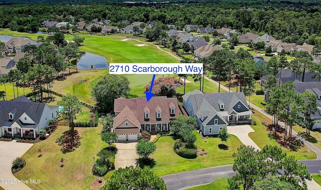 2710 Scarborough Way, Southport, NC 28461 - aerial perspective of suburban area featuring a nearby body of water and a golf club