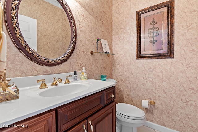 2710 Scarborough Way, Southport, NC 28461 - half bath with vanity and wallpapered walls