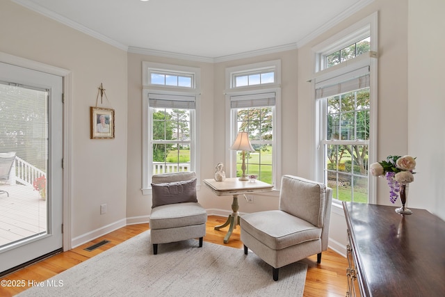 2710 Scarborough Way, Southport, NC 28461 - sitting room with ornamental molding and light wood-type flooring