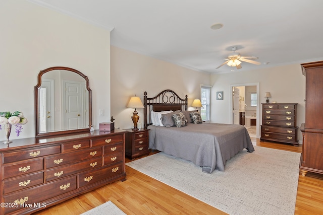 2710 Scarborough Way, Southport, NC 28461 - bedroom with light wood-style floors, crown molding, and connected bathroom