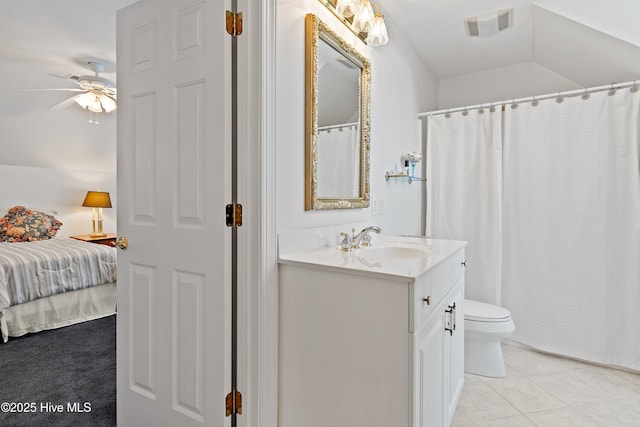 2710 Scarborough Way, Southport, NC 28461 - ensuite bathroom with vanity, a ceiling fan, tile patterned floors, and a shower with shower curtain