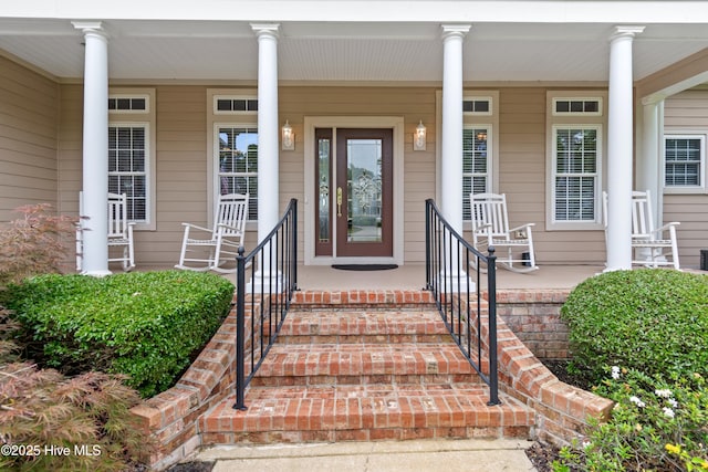 2710 Scarborough Way, Southport, NC 28461 - doorway to property with covered porch