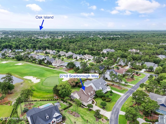 2710 Scarborough Way, Southport, NC 28461 - aerial perspective of suburban area with a nearby body of water and a golf course