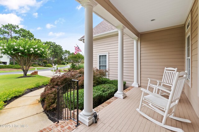 2710 Scarborough Way, Southport, NC 28461 - covered porch with a yard