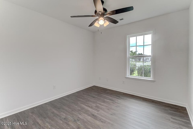 2604 Larne Ct, Wilmington, NC 28411 - unfurnished room featuring dark wood-type flooring and a ceiling fan