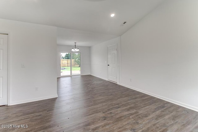 2604 Larne Ct, Wilmington, NC 28411 - empty room featuring a chandelier, dark wood-style floors, and recessed lighting