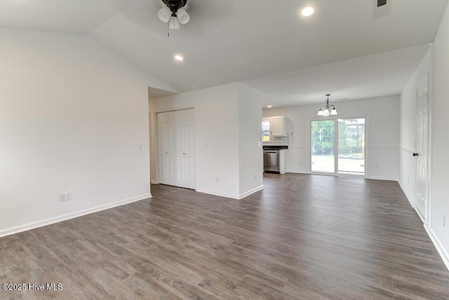 2604 Larne Ct, Wilmington, NC 28411 - unfurnished living room featuring a chandelier, ceiling fan, dark wood finished floors, recessed lighting, and lofted ceiling