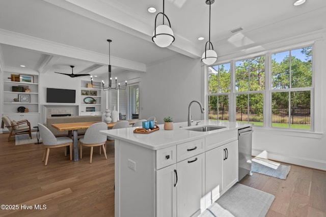 523 Trisail Ter, Wilmington, NC 28412 - kitchen with healthy amount of natural light, dishwasher, light countertops, beam ceiling, and crown molding