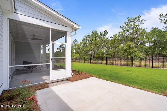 523 Trisail Ter, Wilmington, NC 28412 - fenced backyard with a sunroom, a patio area, and ceiling fan