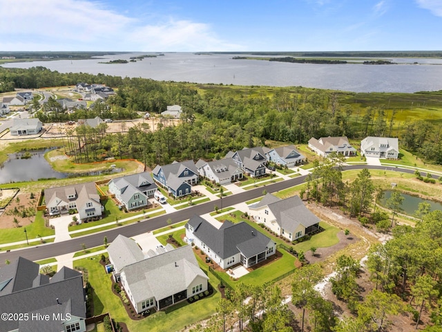 523 Trisail Ter, Wilmington, NC 28412 - aerial view of property and surrounding area with nearby suburban area and a large body of water