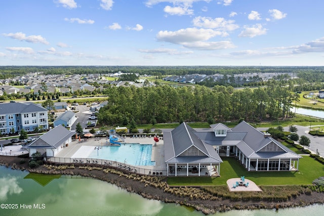 523 Trisail Ter, Wilmington, NC 28412 - drone / aerial view of a nearby body of water and a pool area
