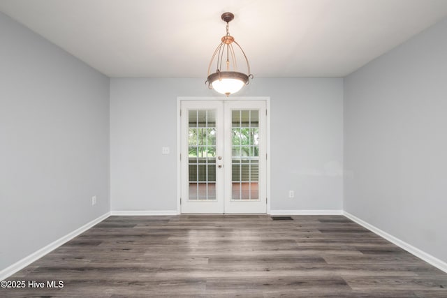 115 Billets Bridge Rd, Camden, NC 27921 - spare room featuring french doors and dark wood-type flooring