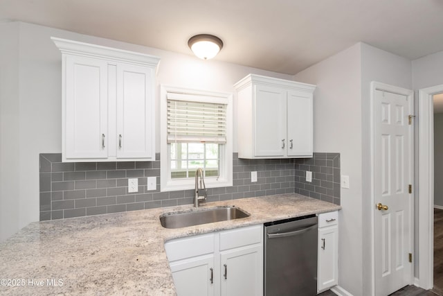 115 Billets Bridge Rd, Camden, NC 27921 - kitchen featuring dishwasher, white cabinetry, decorative backsplash, and light stone countertops