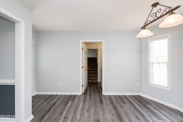 115 Billets Bridge Rd, Camden, NC 27921 - unfurnished room featuring wood finished floors and stairway