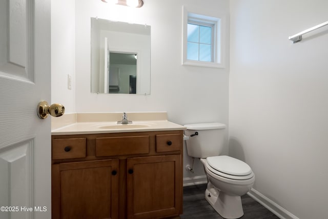 115 Billets Bridge Rd, Camden, NC 27921 - half bath with vanity and wood finished floors