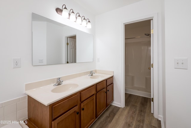 115 Billets Bridge Rd, Camden, NC 27921 - full bath featuring wood finished floors, double vanity, and a shower