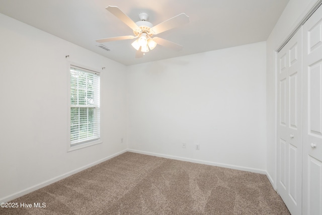 115 Billets Bridge Rd, Camden, NC 27921 - unfurnished bedroom featuring carpet floors, a closet, and ceiling fan