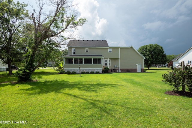115 Billets Bridge Rd, Camden, NC 27921 - rear view of house with a sunroom and a yard