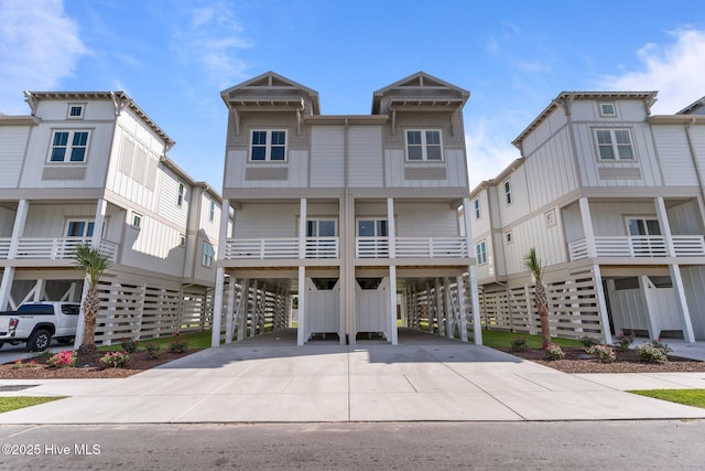 207 Spartanburg Ave Unit 2, Carolina Beach, NC 28428 - coastal home with a carport and driveway