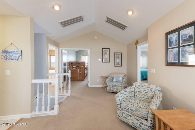 887 Ocean Blvd W, Holden Beach, NC 28462 - living area with carpet floors, lofted ceiling, and an upstairs landing
