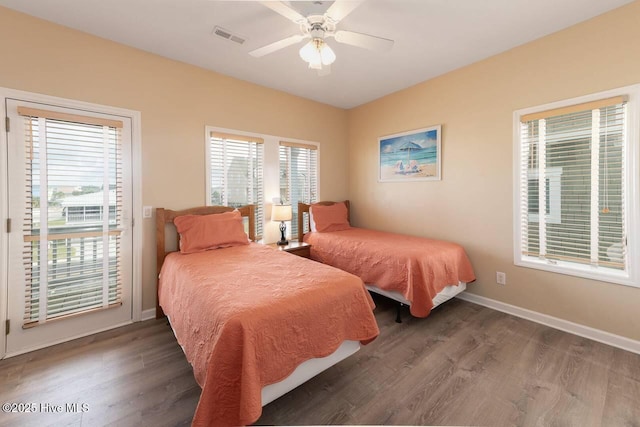 887 Ocean Blvd W, Holden Beach, NC 28462 - bedroom featuring access to outside, wood finished floors, and ceiling fan