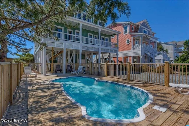 887 Ocean Blvd W, Holden Beach, NC 28462 - view of pool featuring a deck and stairs