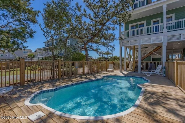887 Ocean Blvd W, Holden Beach, NC 28462 - view of pool featuring a wooden deck and stairs