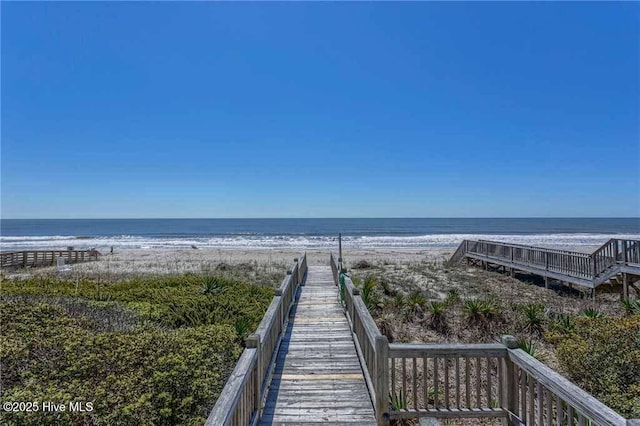887 Ocean Blvd W, Holden Beach, NC 28462 - view of home's community featuring view of water and beach