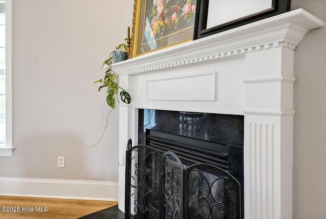 428 Windchime Dr, Wilmington, NC 28412 - detailed view of wood finished floors and baseboards