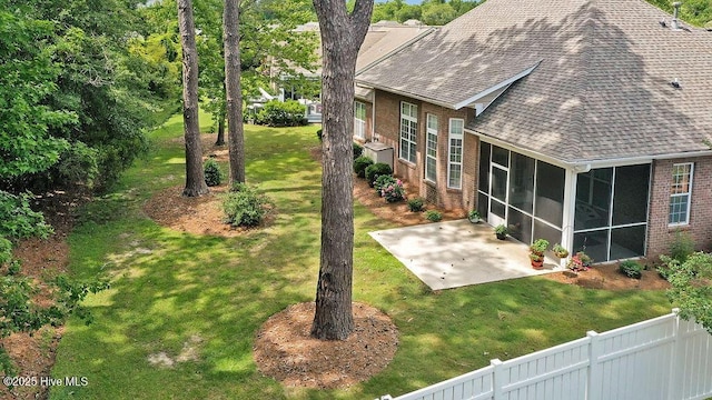 428 Windchime Dr, Wilmington, NC 28412 - view of yard featuring a patio area and a sunroom