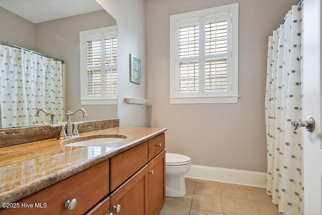 428 Windchime Dr, Wilmington, NC 28412 - bathroom with vanity, plenty of natural light, tile patterned flooring, and a shower with curtain