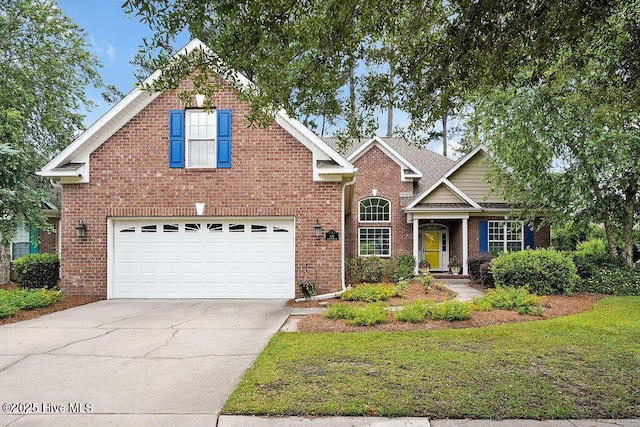 428 Windchime Dr, Wilmington, NC 28412 - traditional-style home featuring a garage, brick siding, driveway, and a front lawn