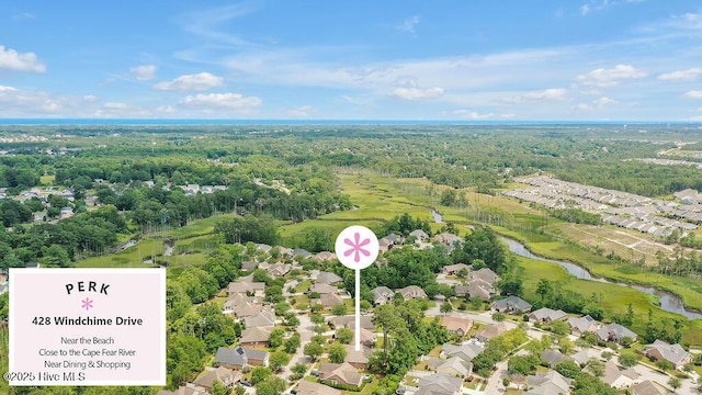 428 Windchime Dr, Wilmington, NC 28412 - aerial view of property's location featuring a large body of water and nearby suburban area