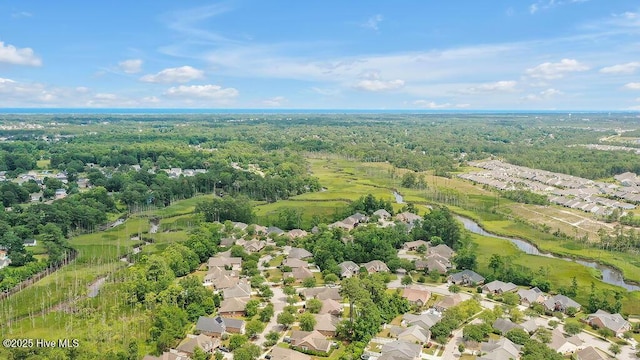 428 Windchime Dr, Wilmington, NC 28412 - aerial view of property and surrounding area featuring a large body of water and nearby suburban area