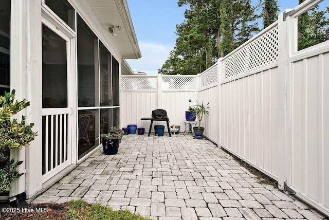 114 W 14th St Unit B, Southport, NC 28461 - fenced backyard featuring a patio