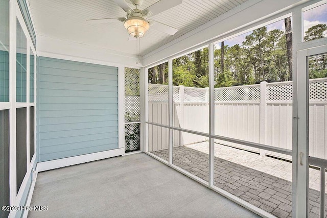 114 W 14th St Unit B, Southport, NC 28461 - unfurnished sunroom featuring a ceiling fan