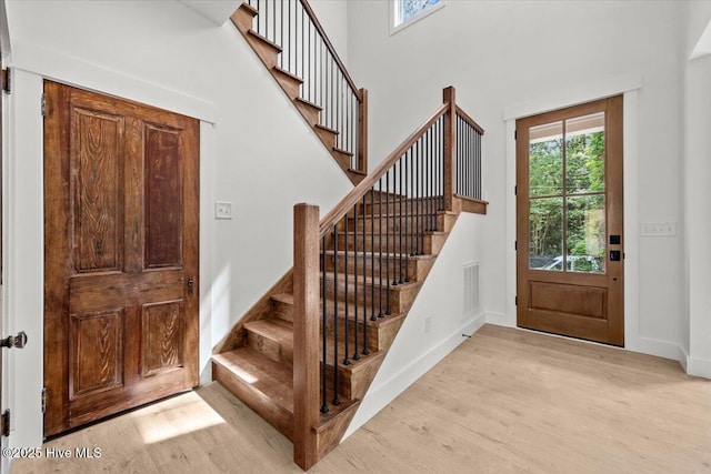 575 E Morganton Rd, Southern Pines, NC 28387 - foyer featuring light wood-style flooring and stairway