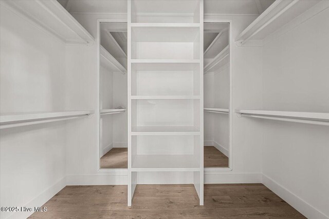 575 E Morganton Rd, Southern Pines, NC 28387 - walk in closet featuring wood finished floors