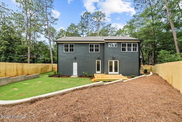 575 E Morganton Rd, Southern Pines, NC 28387 - back of house featuring french doors and a fenced backyard