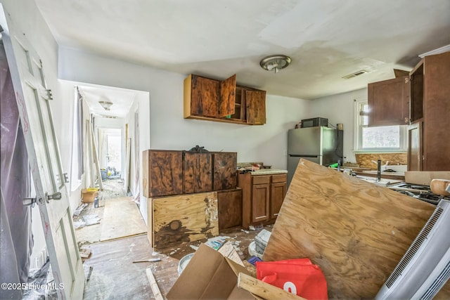 115 Wright St, Wilmington, NC 28401 - kitchen with freestanding refrigerator and light countertops