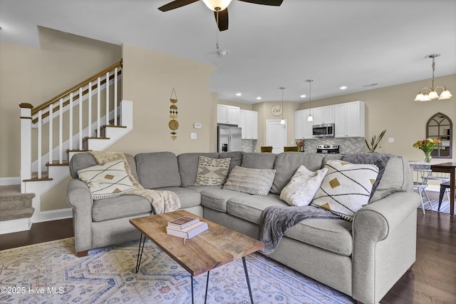 121 Poplar Branch Way, Hampstead, NC 28443 - living area featuring stairway, a chandelier, ceiling fan, recessed lighting, and dark wood-type flooring